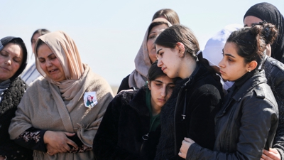 Funeral en Quamishli. REUTERS/Orhan Qereman